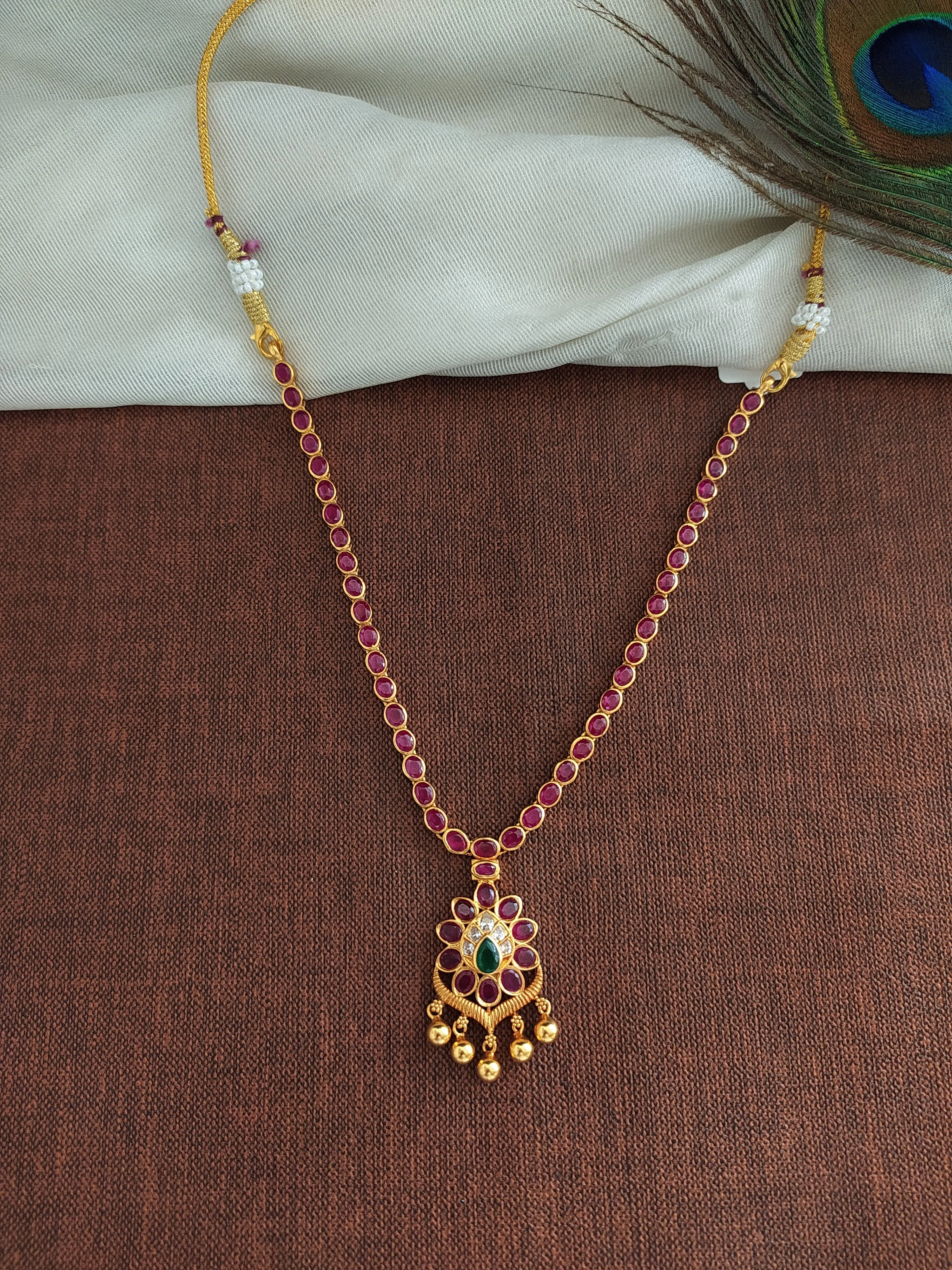 92.5 Pure Silver Ruby Necklace With Center Emerald Stone And Golden Dangling