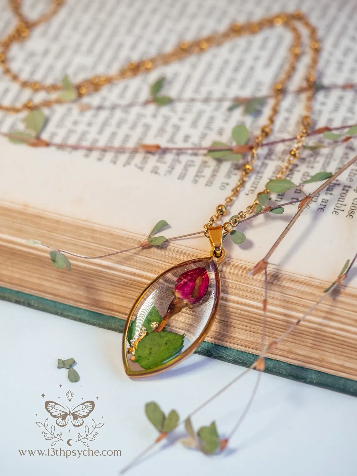 Dried rose bud resin pendant necklace