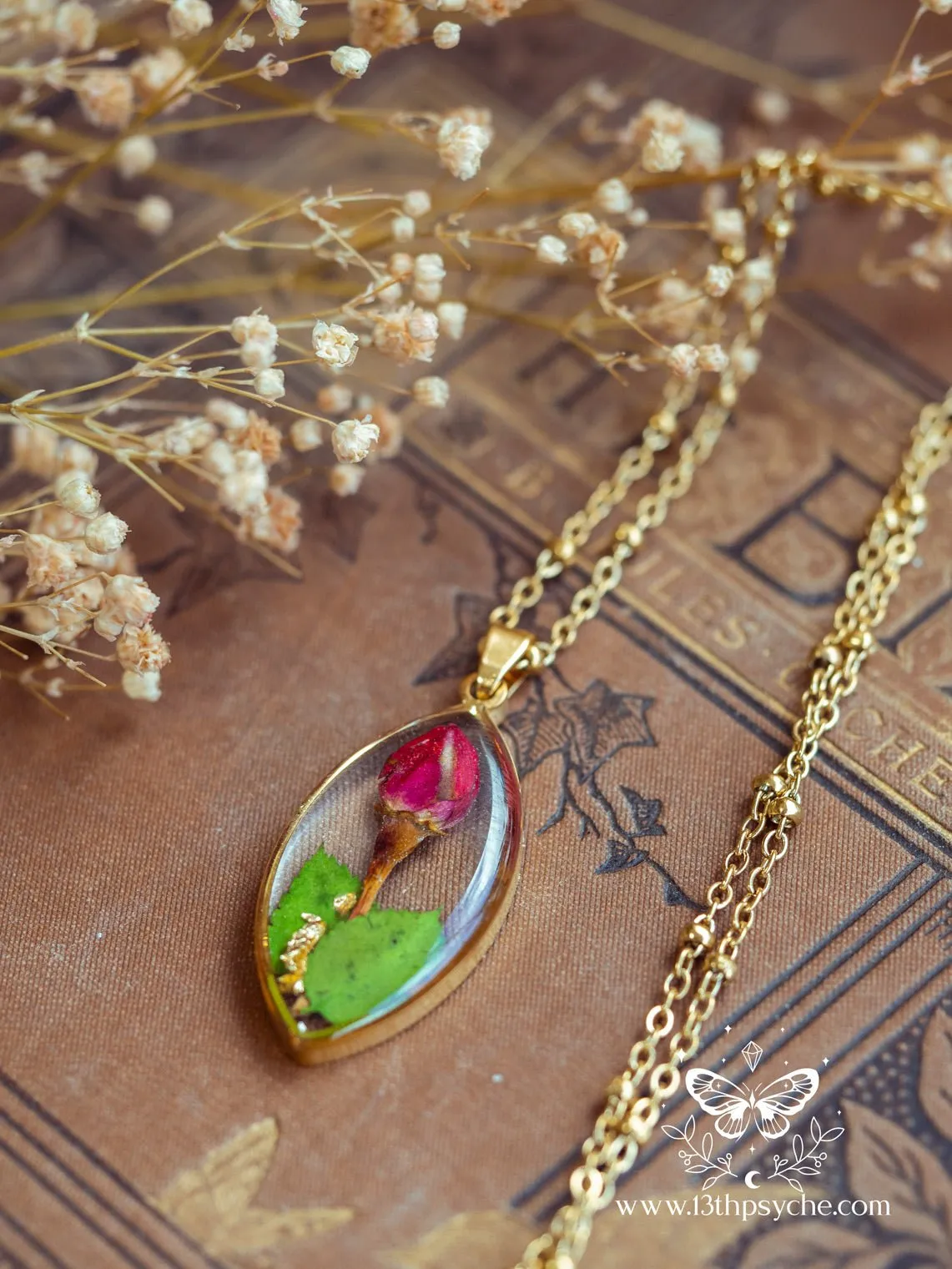 Dried rose bud resin pendant necklace