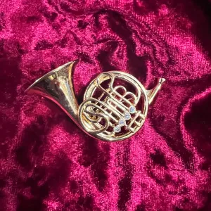 Gold French Horn Brooch  by Cabouchon