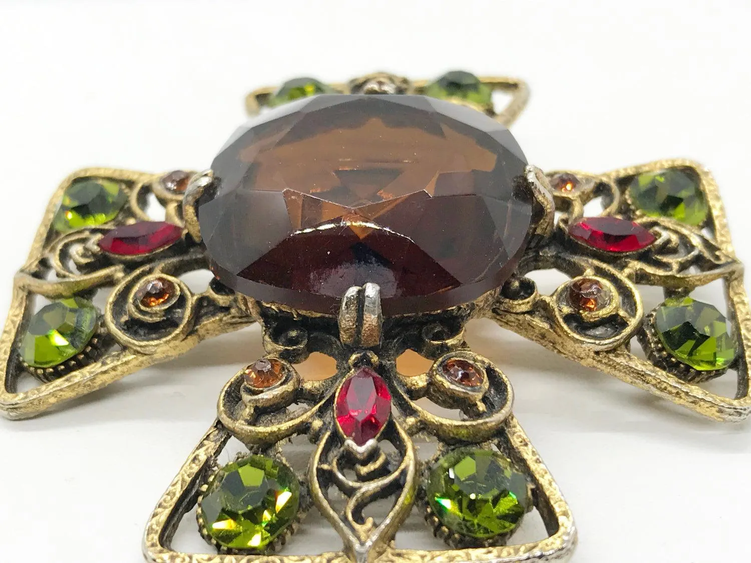 Magnificent Smoked Brown, Olivine Green and Red Capri Cross Brooch