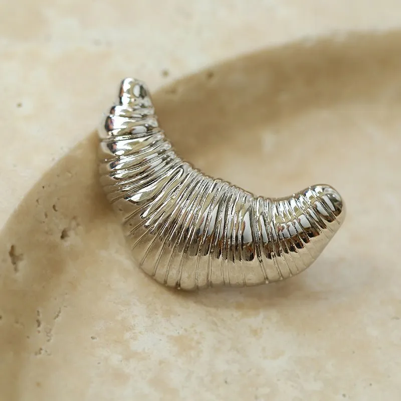 Three-dimensional Croissant Brooch