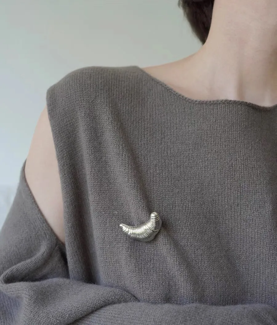 Three-dimensional Croissant Brooch