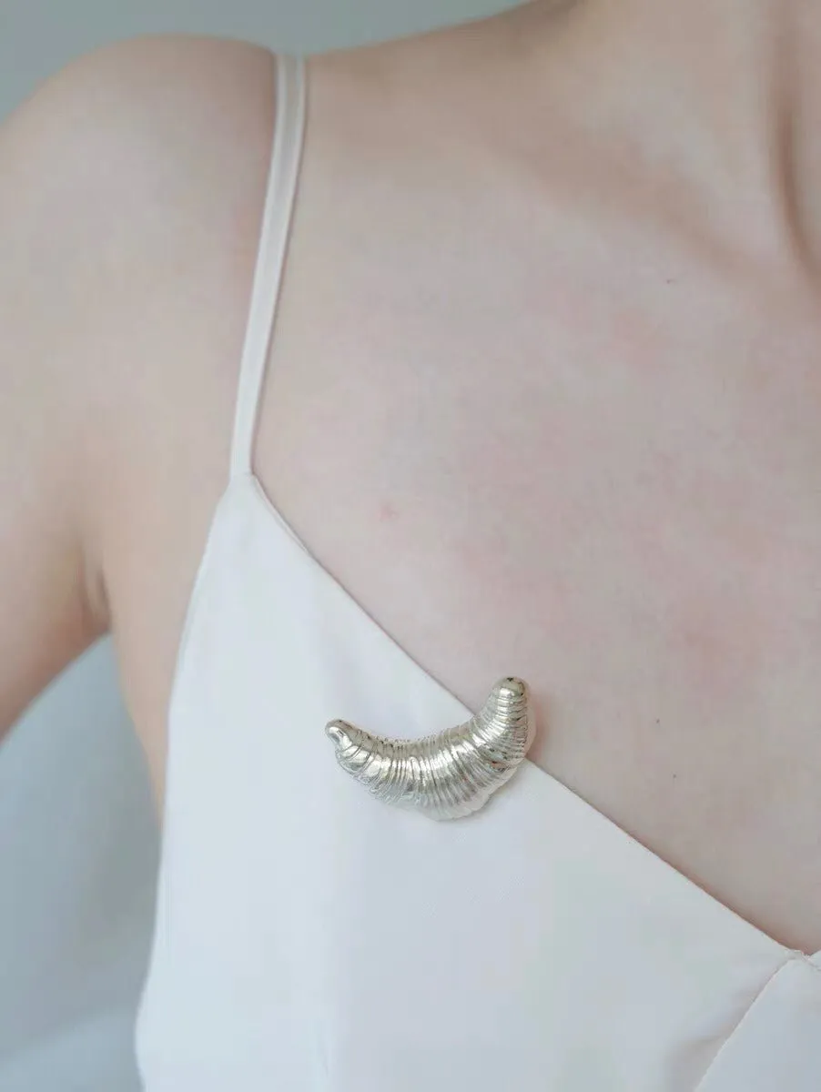 Three-dimensional Croissant Brooch