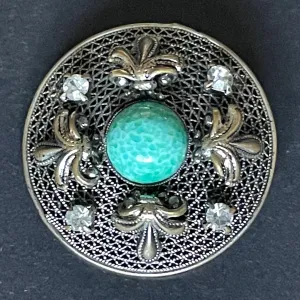 Vintage Czech or Chinese export style Art Deco green Peking glass cabochon and clear rhinestone brooch in silver tone filigree